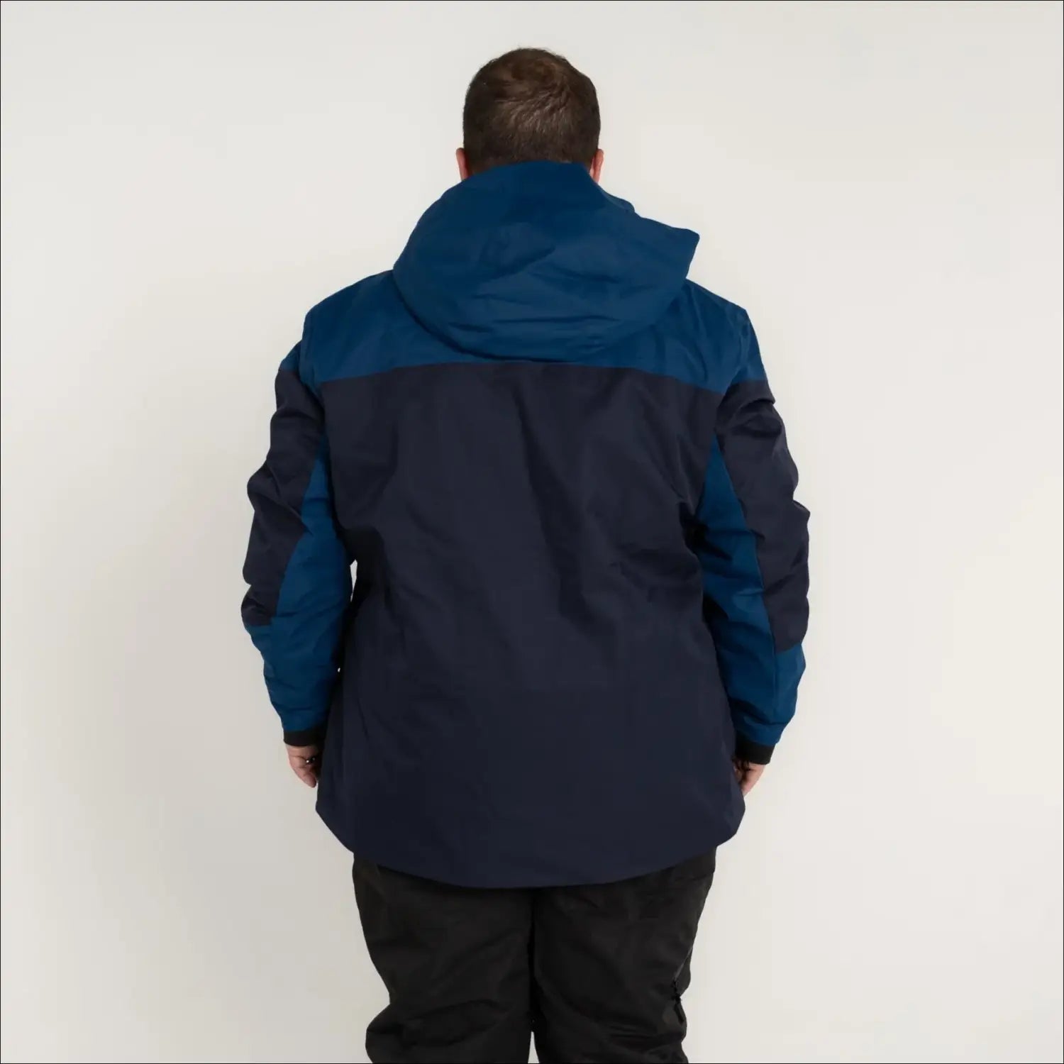 Person wearing a two-tone blue insulated Peak Winter Ski Jacket Snow Coat Outerwear