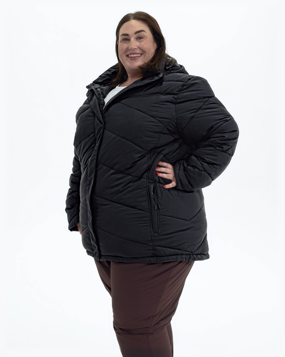 Black Geneva women's plus size mid length synthetic down jacket, three quarter view