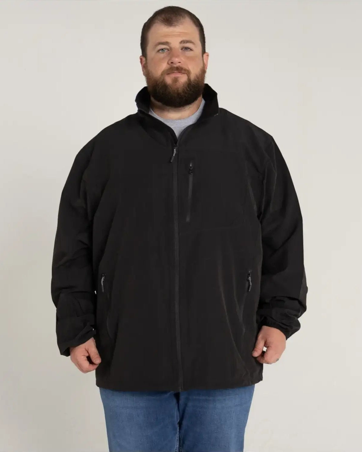 Black zip-up jacket from Men’s Big 3XL-7XL Rain Jacket Light Soft Shell Coat