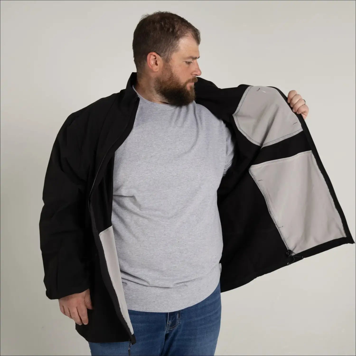 Men’s Big Rain Jacket with black exterior, gray lining, and pockets for spring and fall