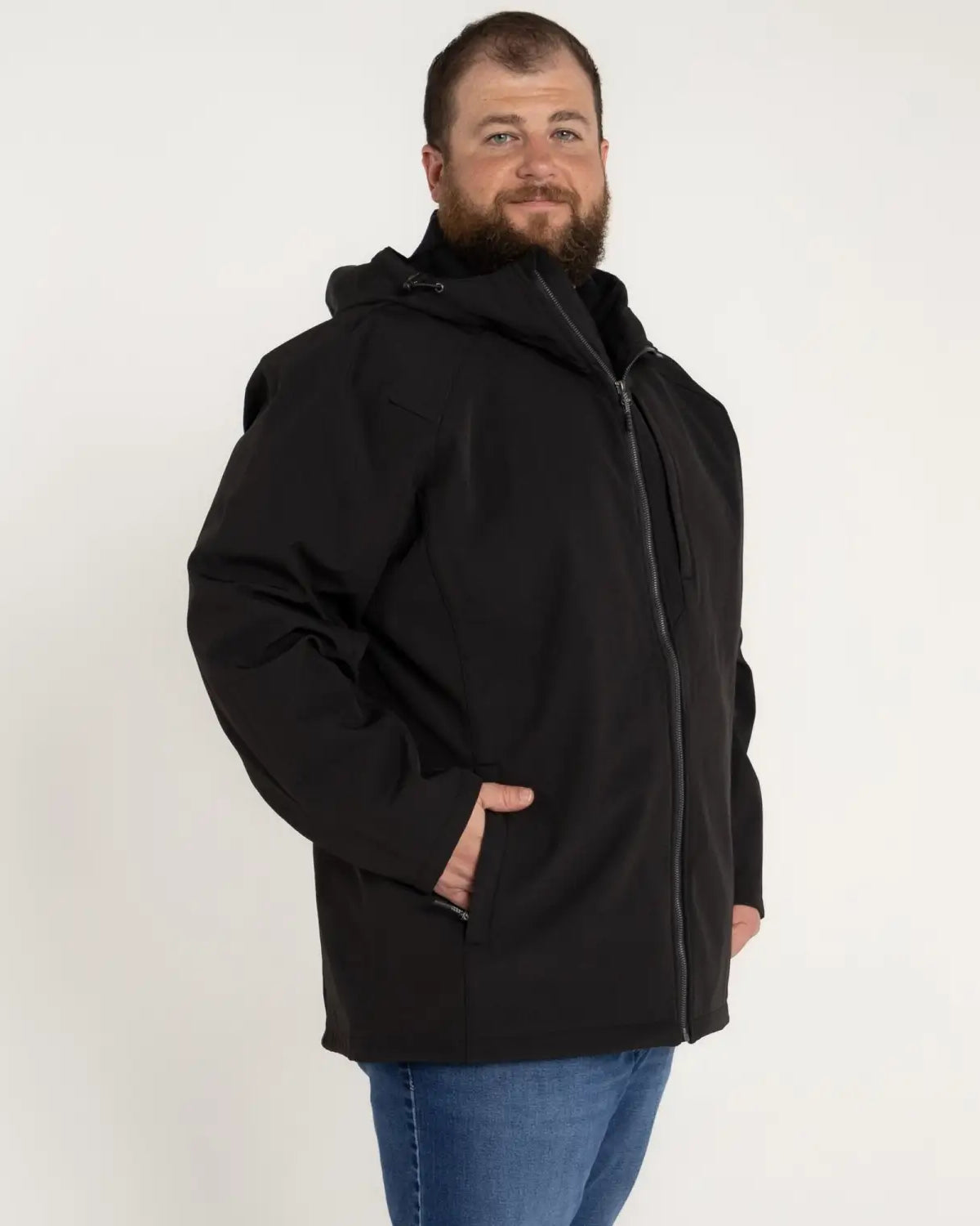 Man in black hooded jacket from Men’s Big 2XL-7XL Cyclone Stretch Soft Shell Outerwear