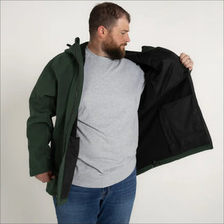 Man in a green Men’s Big 2XL-7XL Cyclone Stretch Soft Shell Hooded Jacket Coat Outerwear