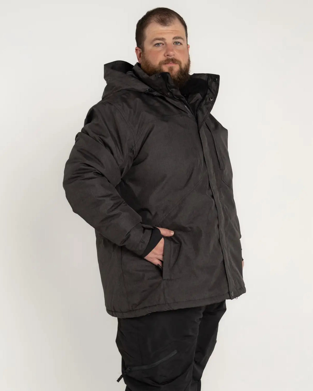 Man in a dark insulated winter snow ski jacket from Men’s Big Sizes 2XL-6XL Outerwear