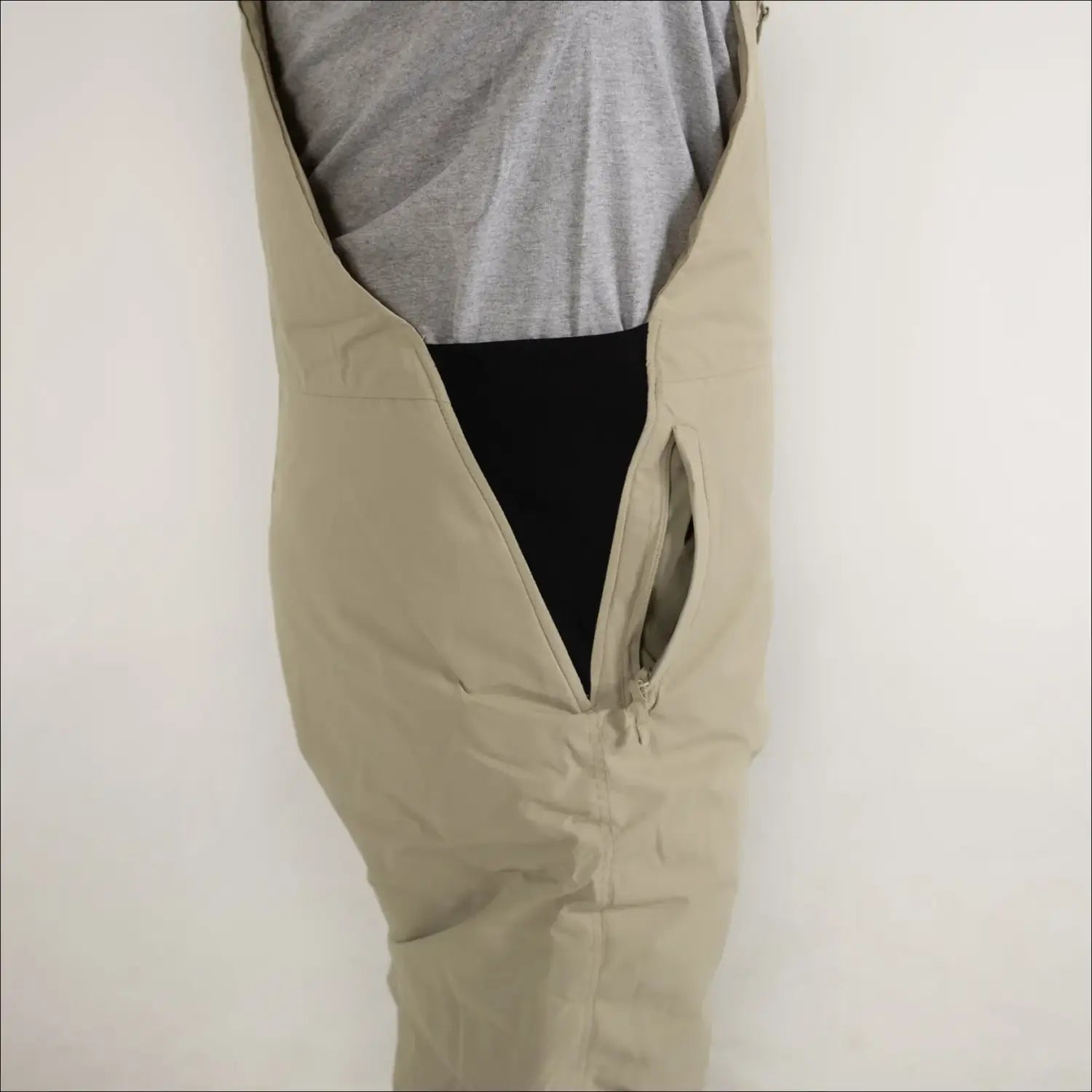 Beige overall pants with open front from Snow Country Outerwear Men’s Ski Bibs
