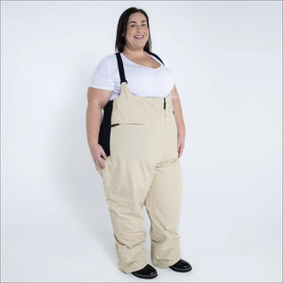 Beige plus-size snow bib from Snow Country Outerwear Women’s Vertex Winter Ski Bibs