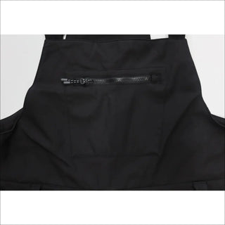 Black women’s plus size soft shell ski bibs with zippered pocket for winter sports