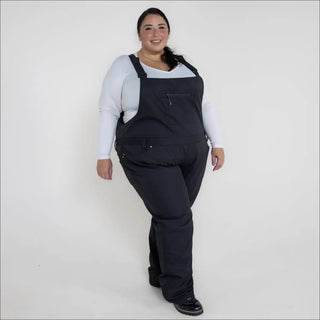 Black snow bib overalls for women shown in 1X-6X Plus Size Soft Shell Ski Bibs