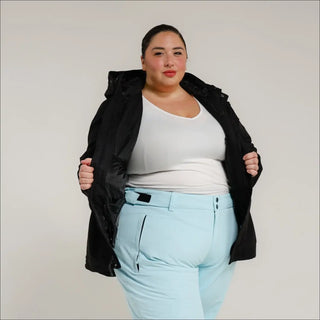 Woman in ski apparel wearing Snow Country Plus Size Uptown Winter Parka Ski Coat