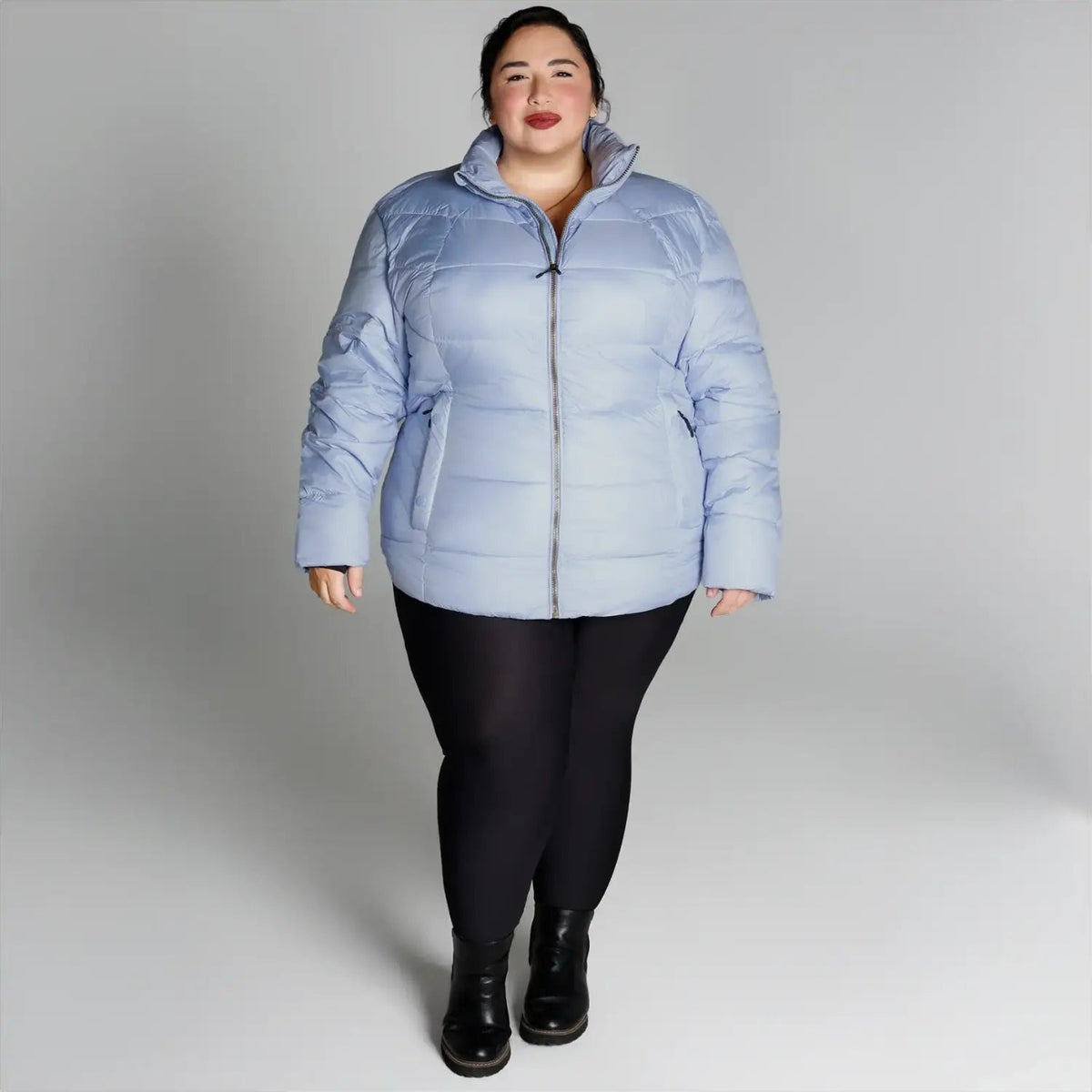 Light blue puffer jacket from Snow Country Outerwear Women’s Plus Size Lexington collection