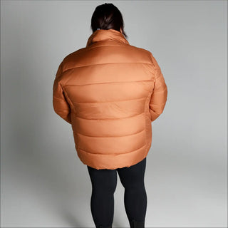 Copper-colored puffer jacket from Snow Country Outerwear Women’s Plus Size Lexington collection