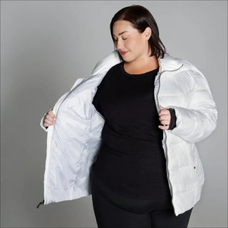 White puffer jacket from Snow Country Outerwear Women’s Plus Size Lexington Synthetic Winter Coat