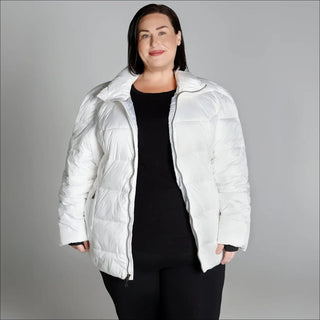 Woman wearing a White Puffer Jacket from Snow Country Plus Size Winter Outerwear