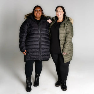 Women wearing plus size Element Parka Jackets in winter outdoor setting