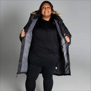 Woman in open black winter parka jacket from Women’s Plus Size Element Parka Coat collection