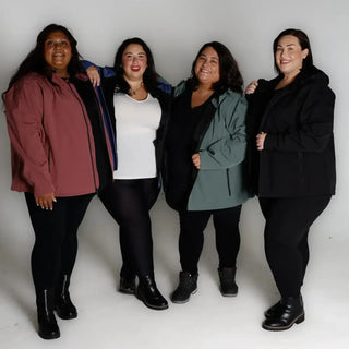 Four plus-size women wearing Micro Fleece Soft Shell jackets in spring or fall weather