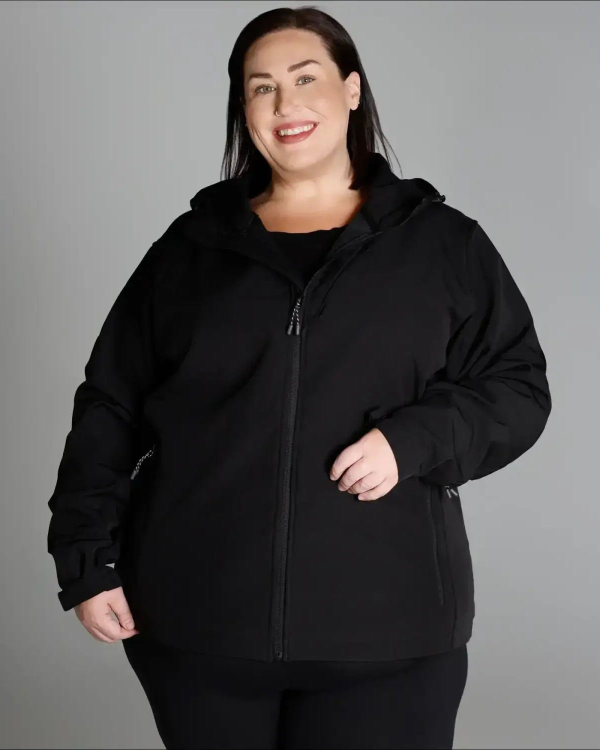 Black hooded zip-up jacket from Women’s Plus Size Micro Fleece Soft Shell Outerwear