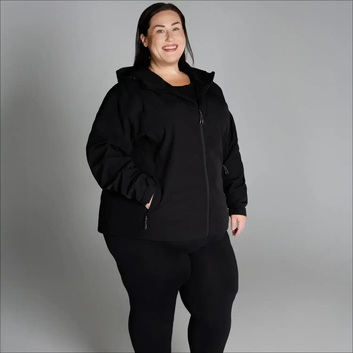 Woman in black hooded fleece jacket and leggings, plus size spring fall outerwear