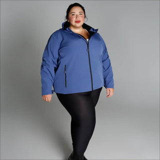 Woman in blue hooded jacket and black leggings wearing plus size Micro Fleece Soft Shell outerwear