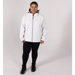 Woman wearing Pulse Plus Size Soft Shell Jacket with black leggings and boots