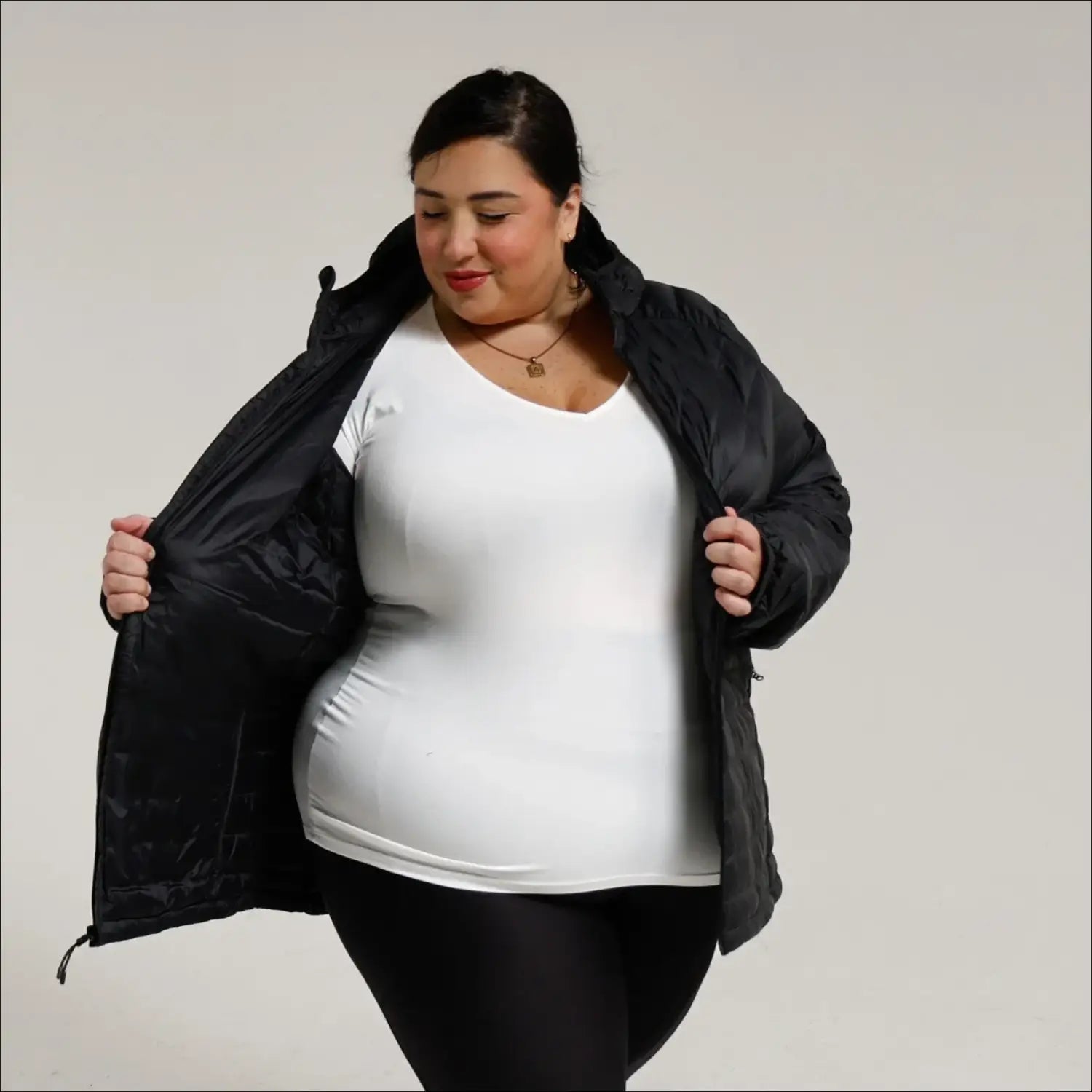 Woman in black puffer jacket wearing Women’s 1X-6X Plus Packable Down Coat