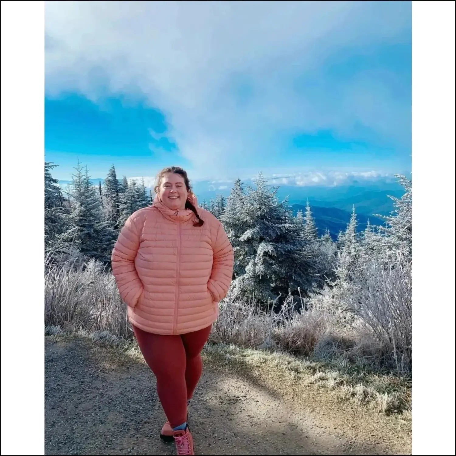 Woman in pink puffer jacket wearing hooded coat from Women’s Plus Size Packable Down Outerwear