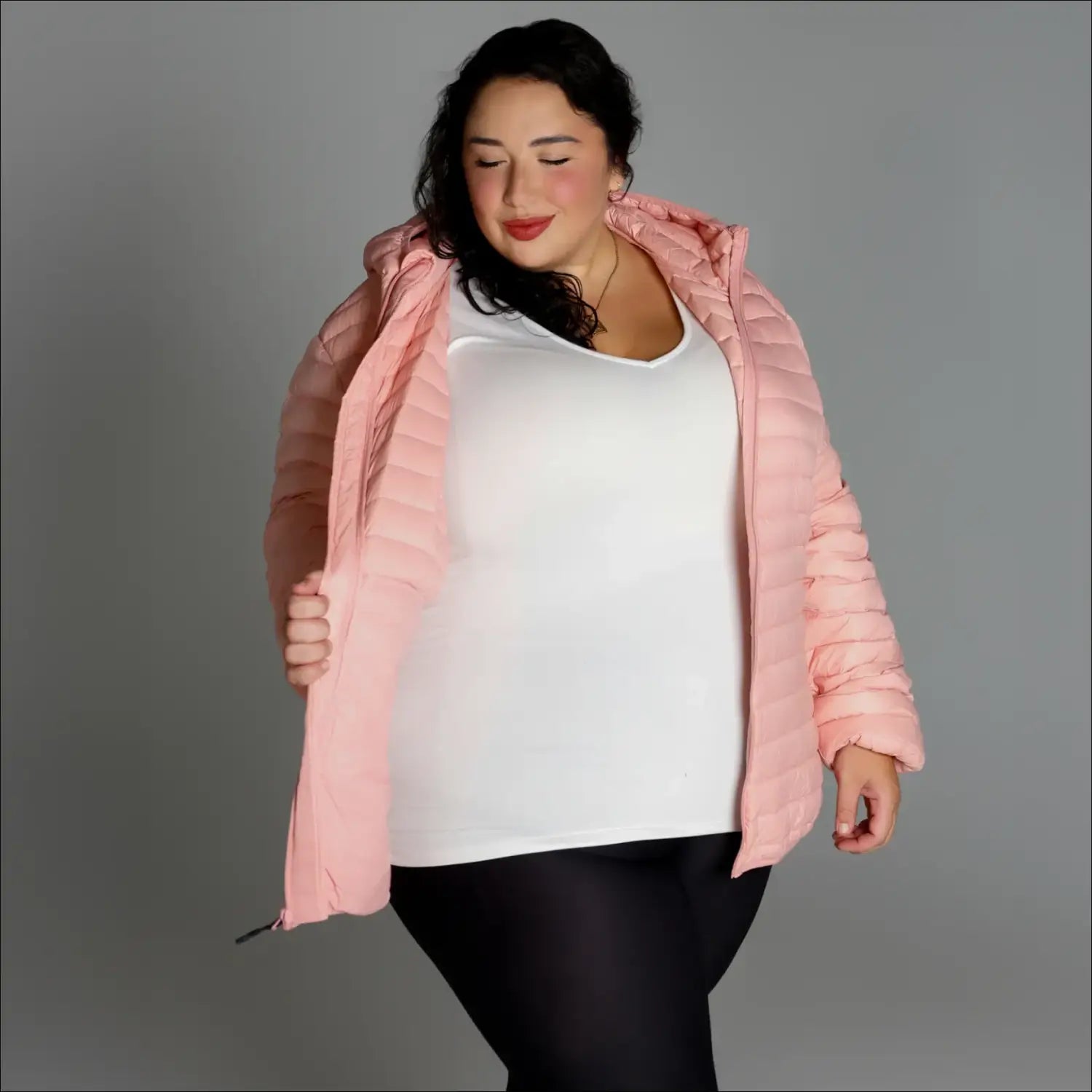 Woman in pink puffer jacket showcasing Women’s 1X-6X Plus Packable Down Coat Outerwear