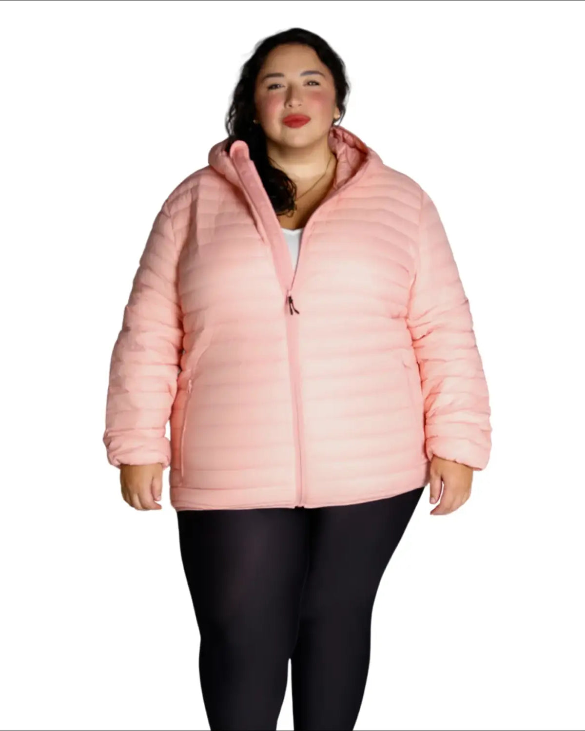 Woman wearing a pink puffer jacket from Women’s Plus Size Packable Down Coat Outerwear