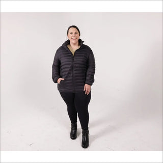 Woman in black puffer jacket wearing Sportcaster Women’s Plus Size Packable Down Jacket