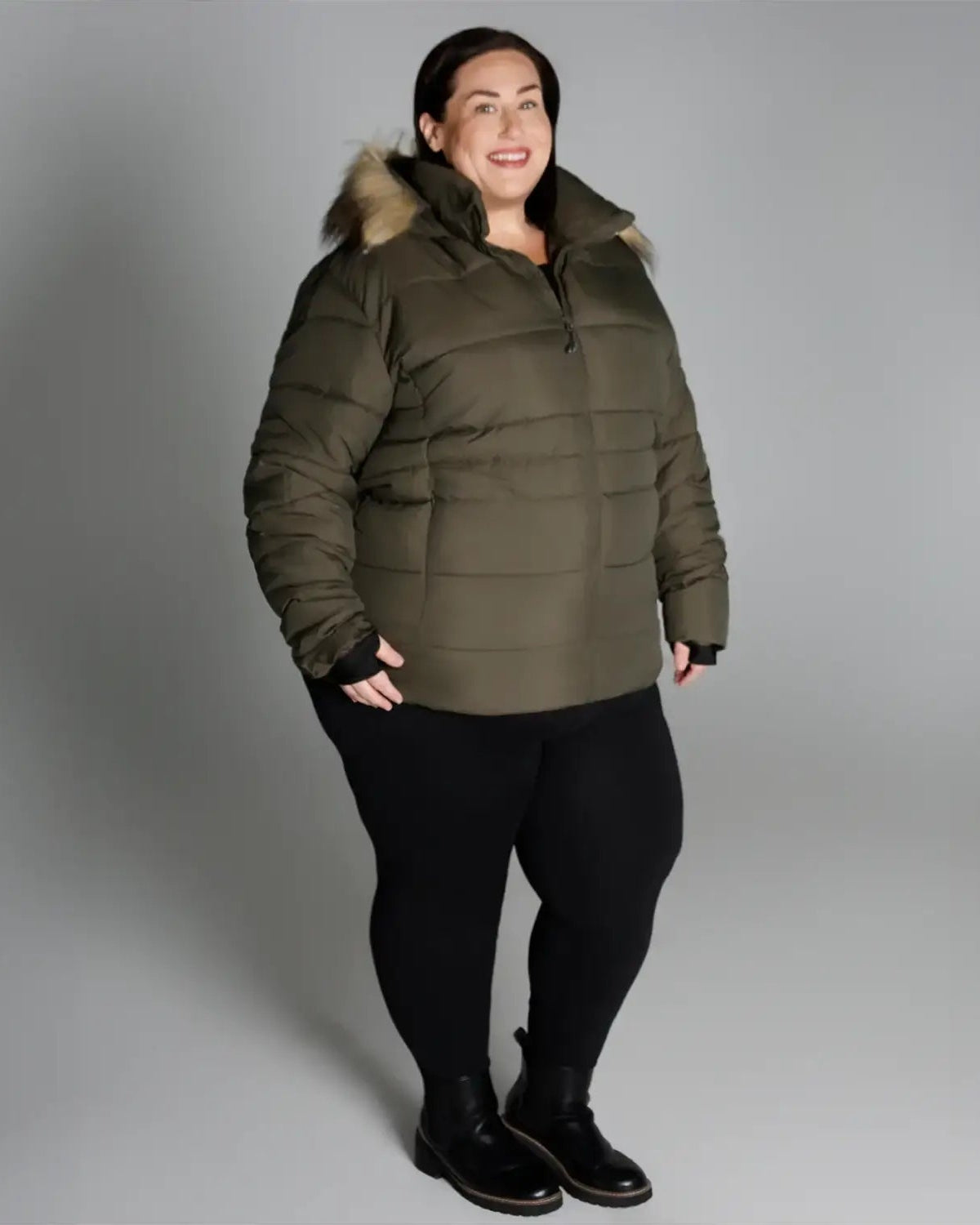 Olive green puffer jacket with fur trim from Snow Country Outerwear for plus size women