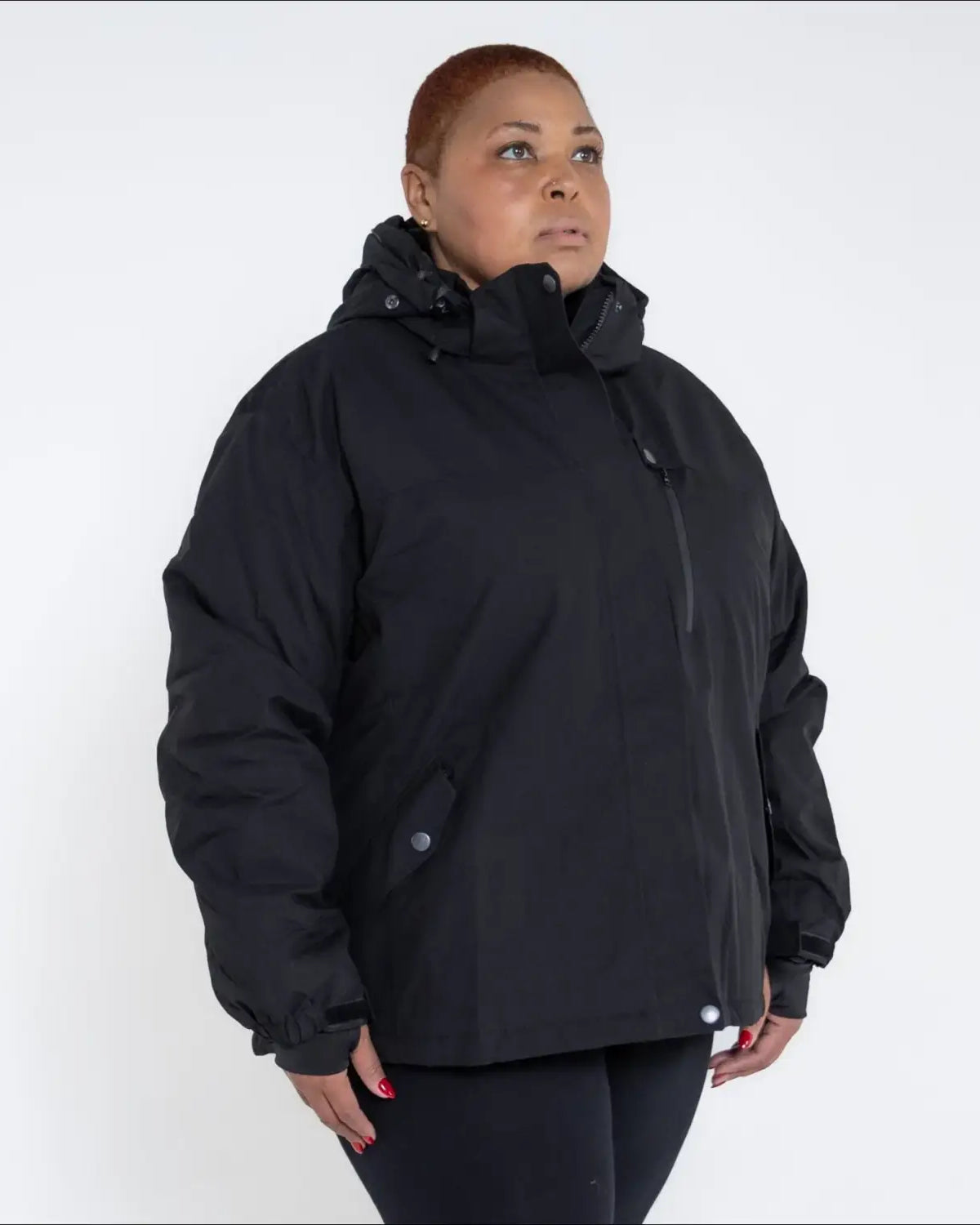 Black hooded winter jacket from Snow Country Outerwear Women’s Plus Size Fortress collection