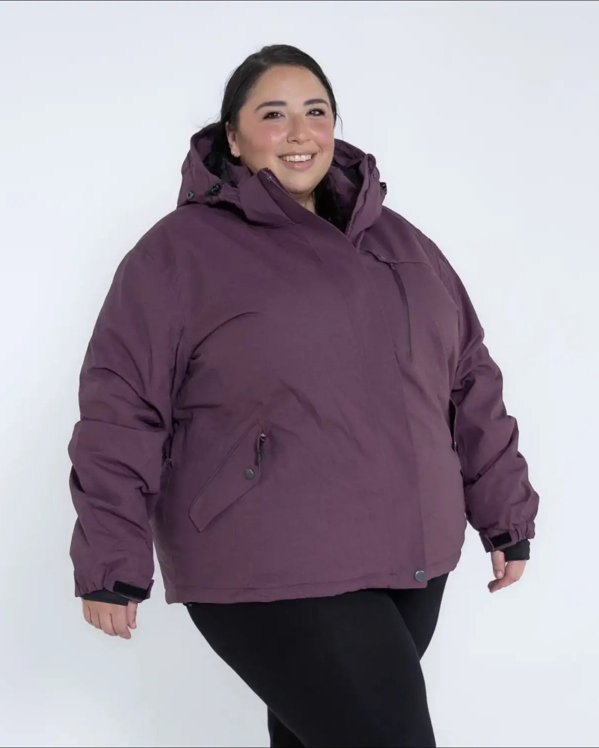 Plum-colored hooded winter jacket from Snow Country Outerwear plus size snow ski coat