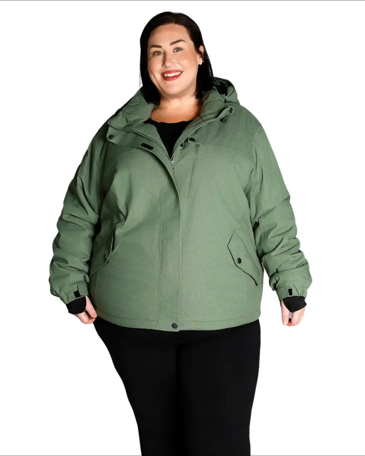 Woman wearing a green hooded jacket from Snow Country Outerwear Fortress Winter Ski Coat