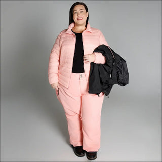 Woman in pink quilted ski suit wearing Women’s Plus Size 1X-6X winter coat outerwear
