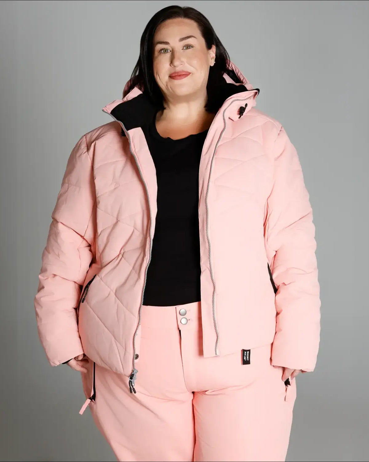Woman in pink Snow Country Outerwear Vail Ski Coat Jacket during clearance sale