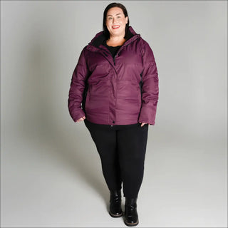 Plum-colored puffer jacket from Snow Country Outerwear Women’s Aspen Ski Coat collection
