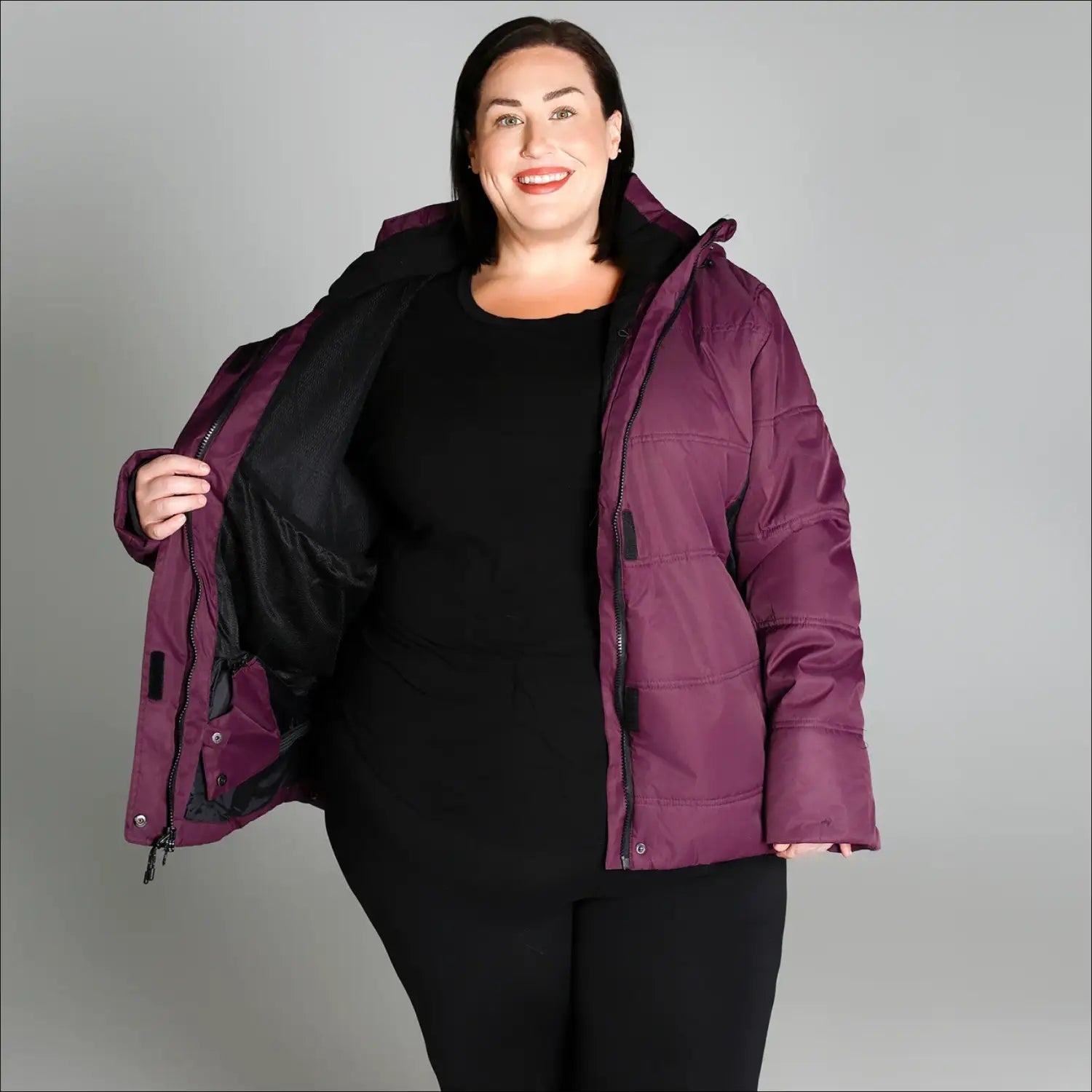 Plum-colored puffer jacket from Snow Country Outerwear Womens Aspen Ski Jacket Coat
