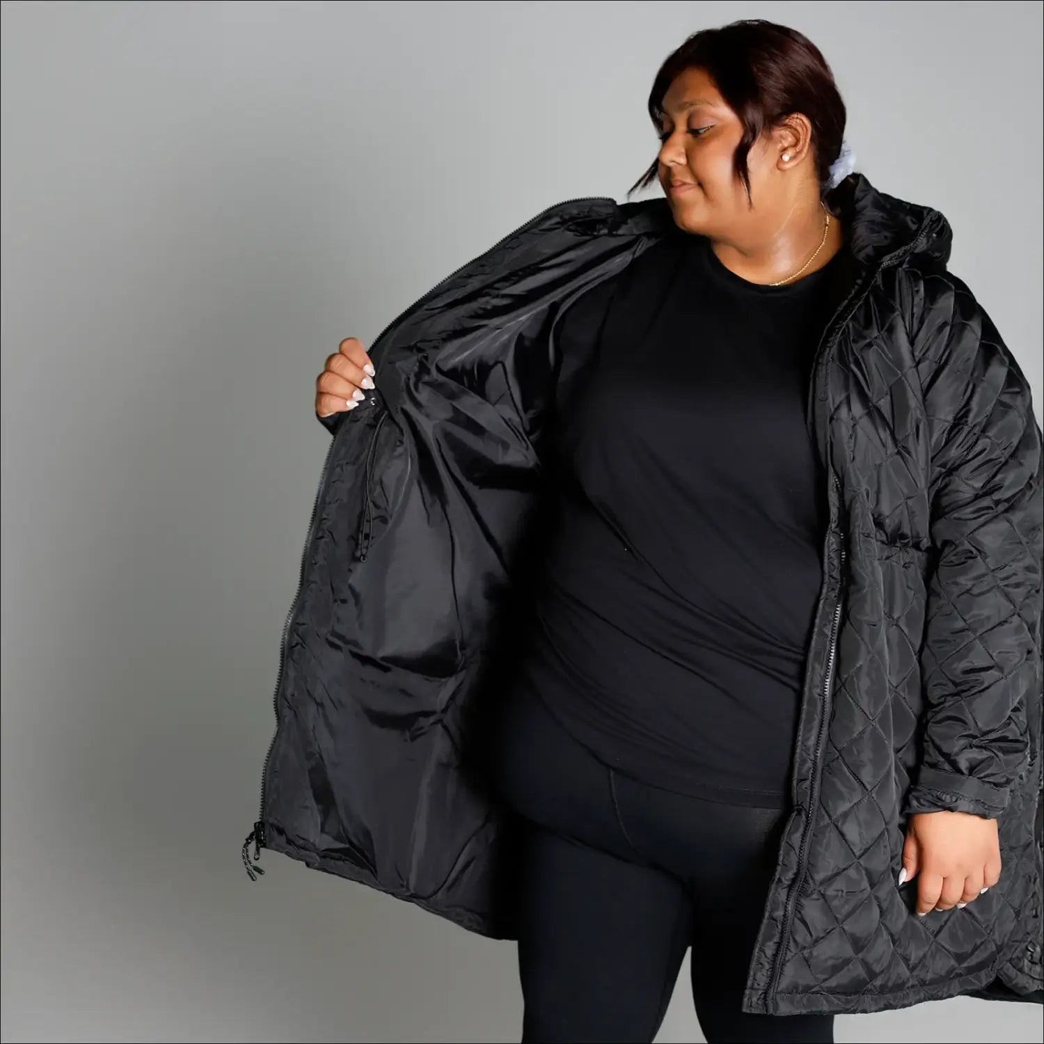 Plus size black quilted puffer coat for women in Long Transitional jacket style