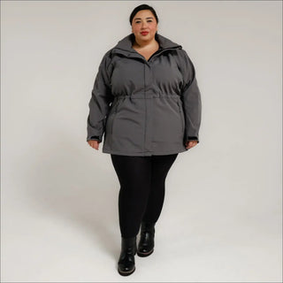 Woman wearing a gray plus size Stowe Mid Length Soft Shell Jacket