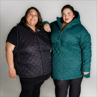 Two women wearing plus size insulated quilted vests from Savvy Outerwear