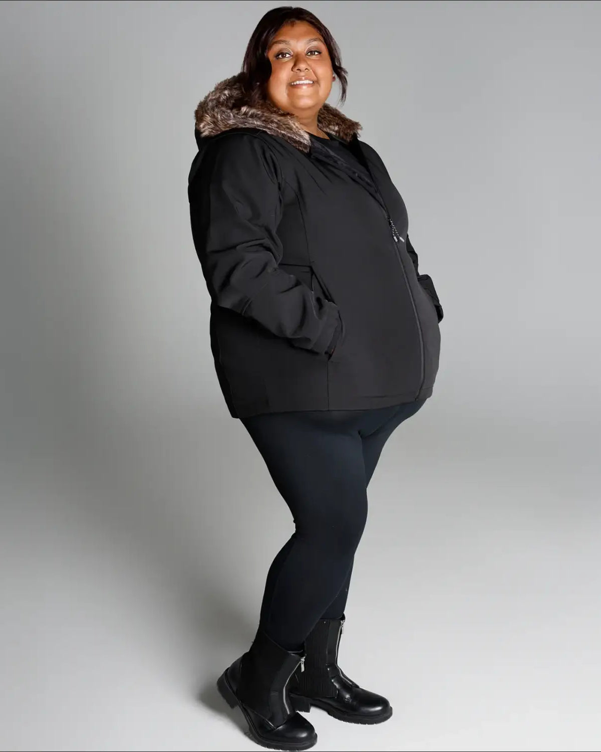 Black winter coat with fur trim from Women’s Plus Size Alta Faux Fur Soft Shell Jacket Coat Fall Spring