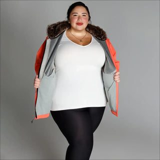 Woman wearing an open orange plus size Alta Faux Fur Shell Jacket Coat in fall or spring