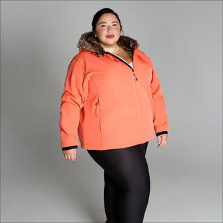 Coral-colored winter jacket with faux fur trim from Women’s Plus Size Alta Soft Shell Coat