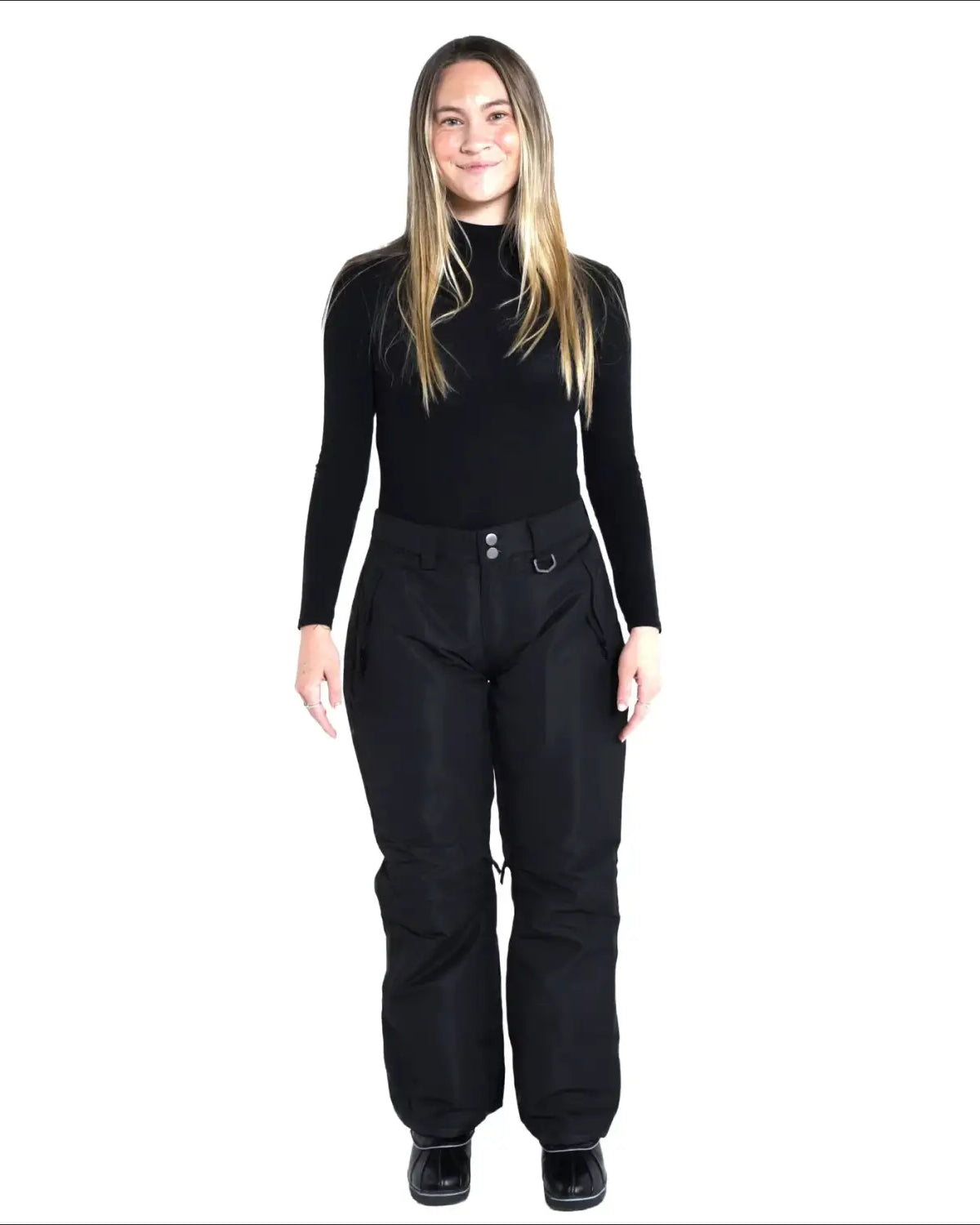 Woman in black turtleneck and snow pants wearing Snow Country Women’s Ski Pants