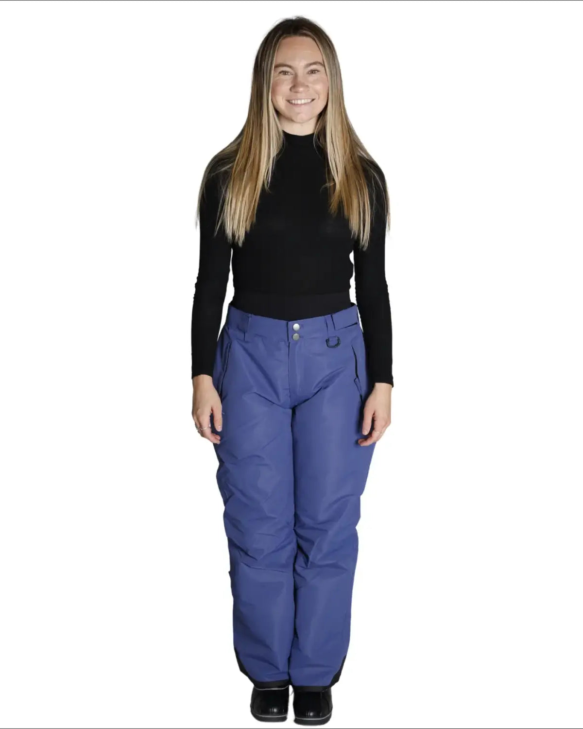 Woman wearing blue Snow Country Outerwear insulated ski pants ideal for snowboarding