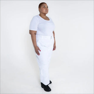 Woman in white outfit wearing Snow Country Plus Size Insulated Ski Pants