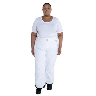 Woman wearing white ski pants and t-shirt in Snow Country Outerwear plus size insulated ski pants
