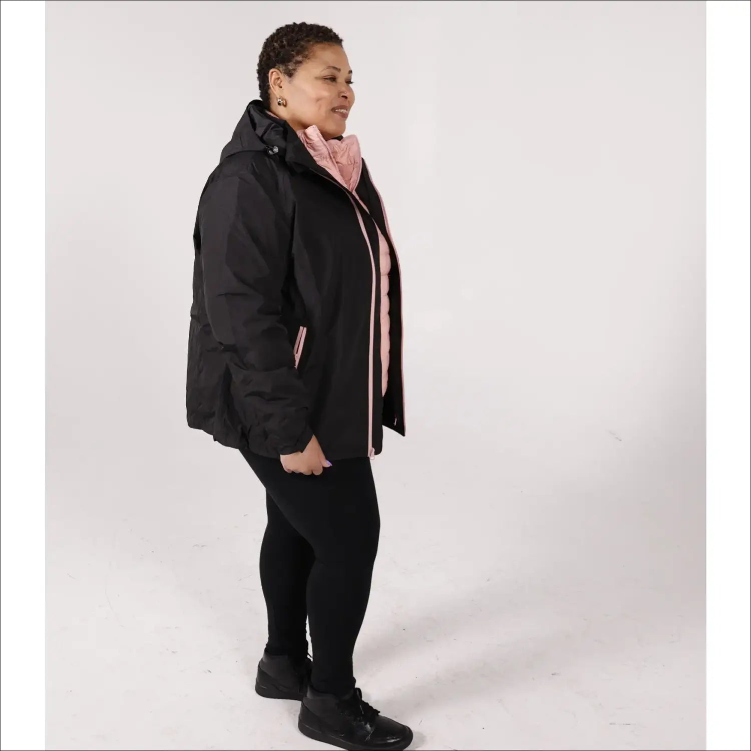 Woman in black winter coat from Women’s Plus Size Winter Down Alternative 3-in-1 Coat Jacket Snow Country Outerwear Alps