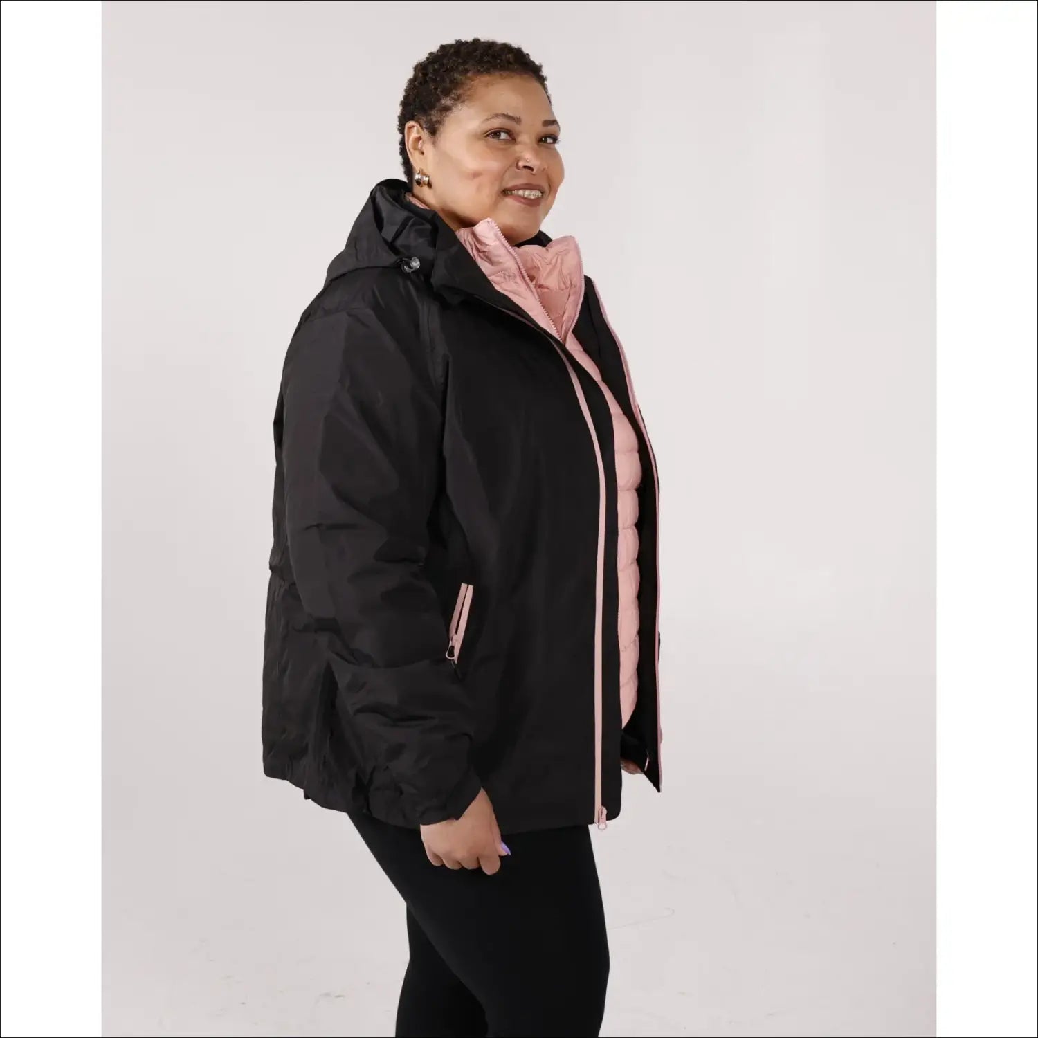 Black hooded puffer jacket with pink lining from Women’s Plus Size Winter Coat collection