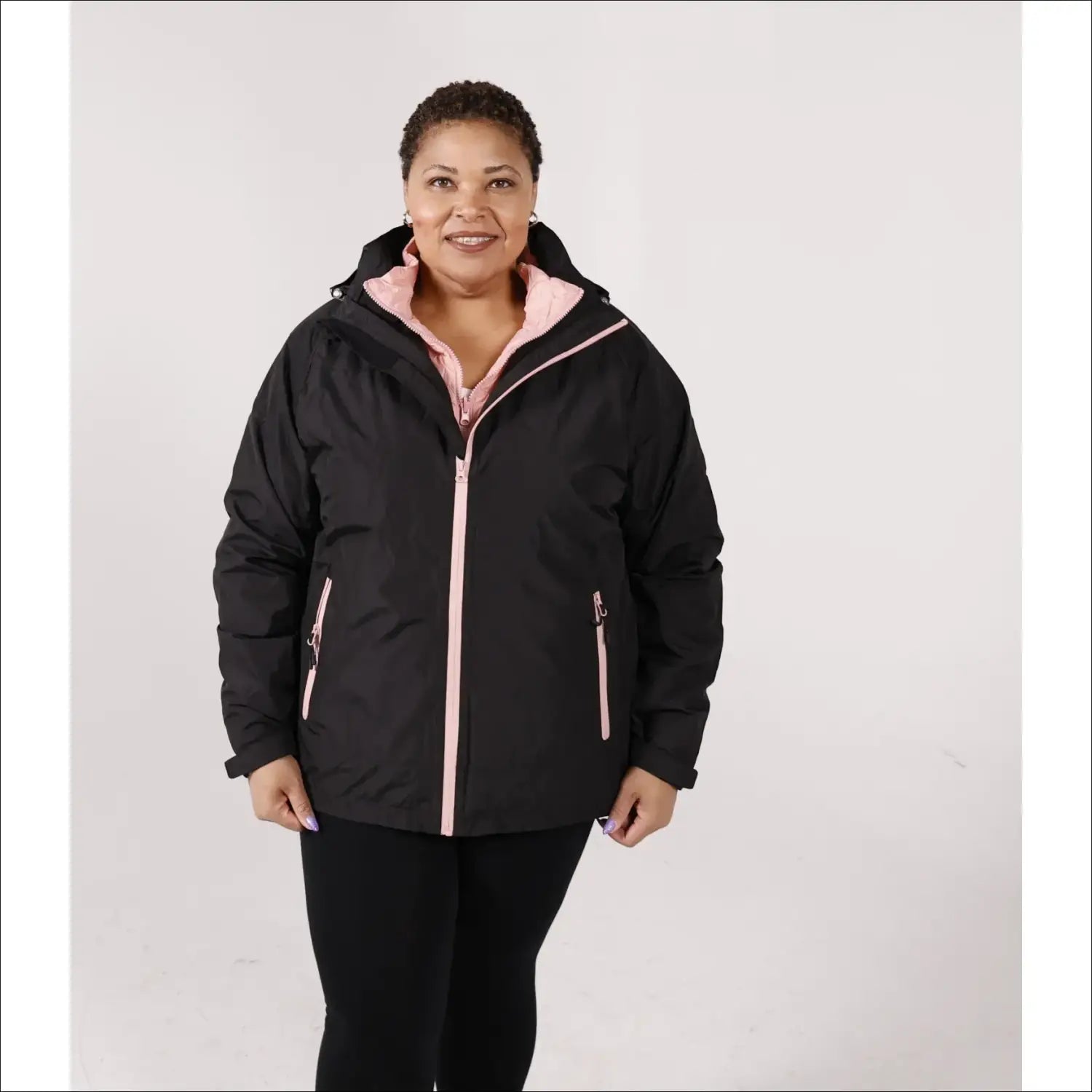 Black winter jacket with pink accents from Women’s Plus Size 1X-6X 3-in-1 Down Alternative Coat