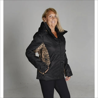 Woman in black and leopard print ski jacket from Snow Country Outerwear on sale